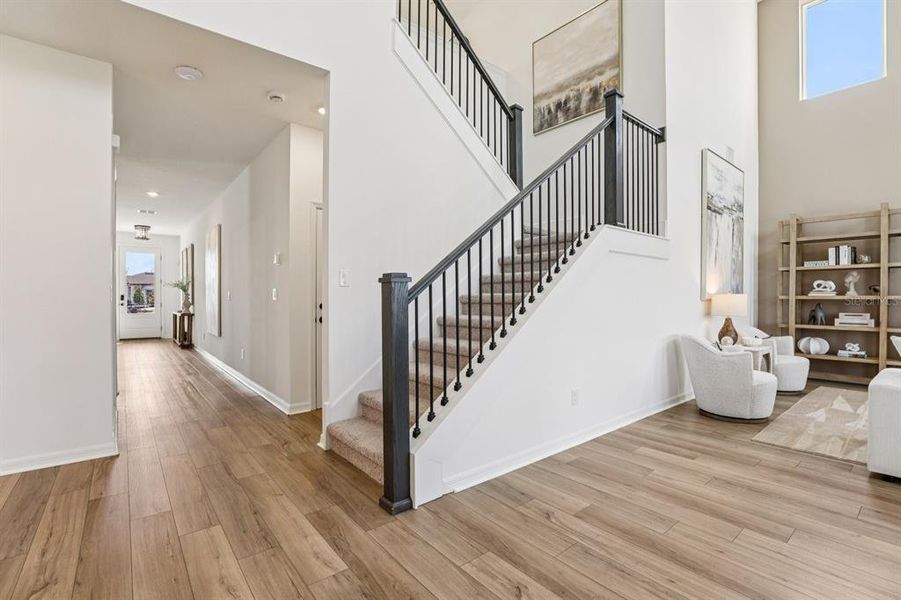 Furnished interior view inside a new home in Hawks Run, Kissimmee (Image 18).