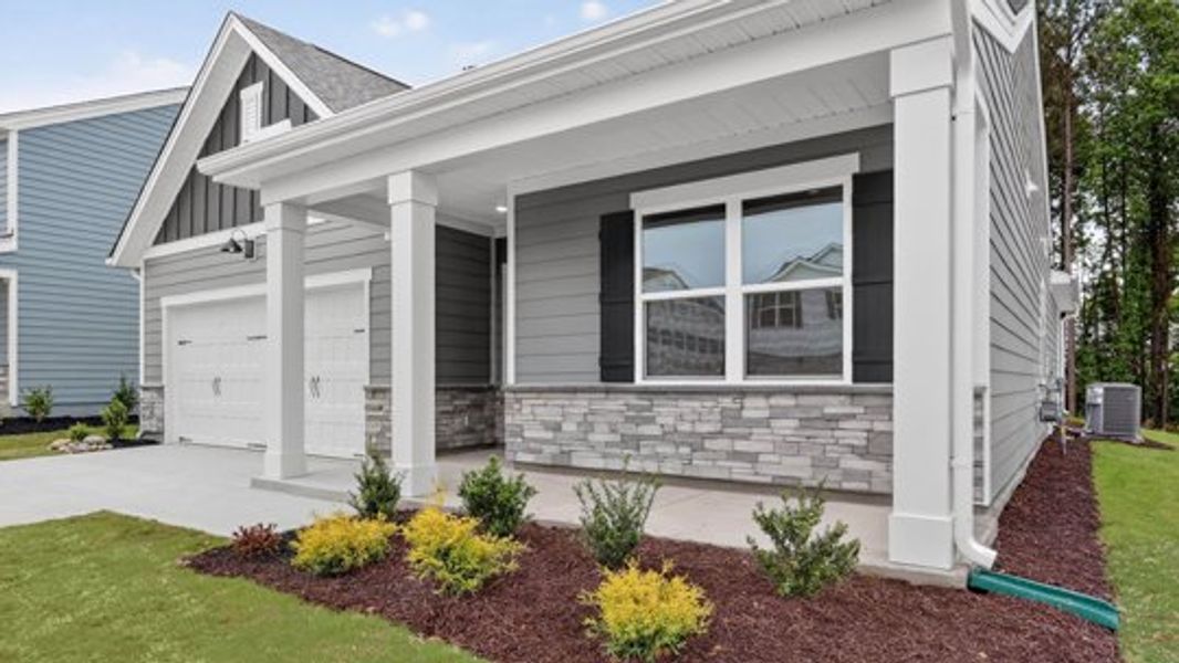 Exterior details and patio area of a home in East Ridge, Ayden (Image 3).