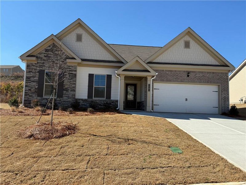 Front exterior of a new home in Hellen Valley, Braselton, GA, highlighting curb appeal (Image 1). Front exterior of a new home in Hellen Valley, Braselton, GA, highlighting curb appeal (Image 1).