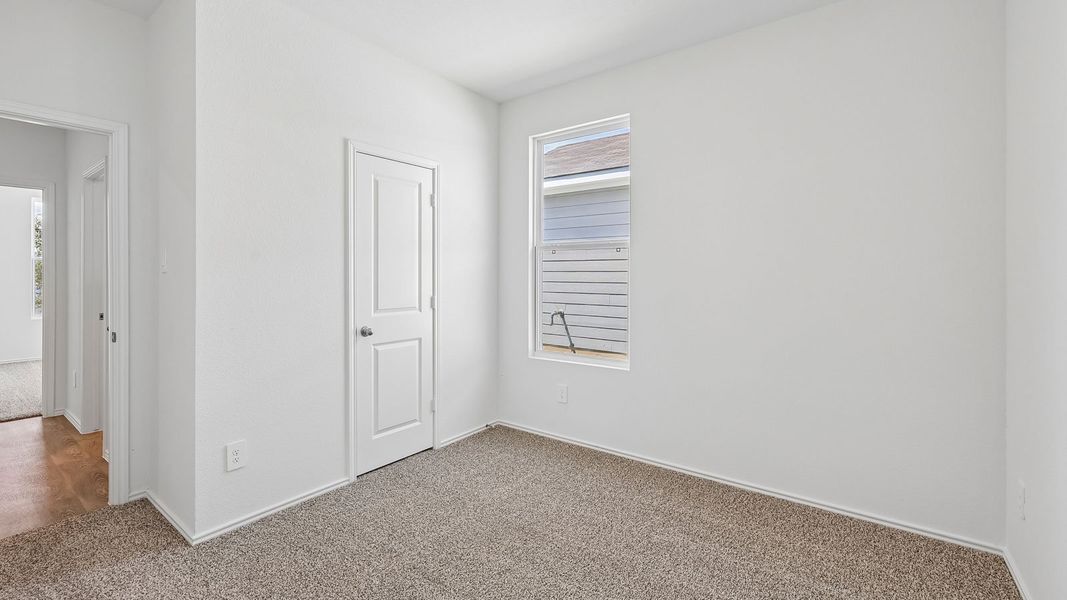 Spacious, unfurnished interior of a new home in Wayside, Uhland (Image 23).