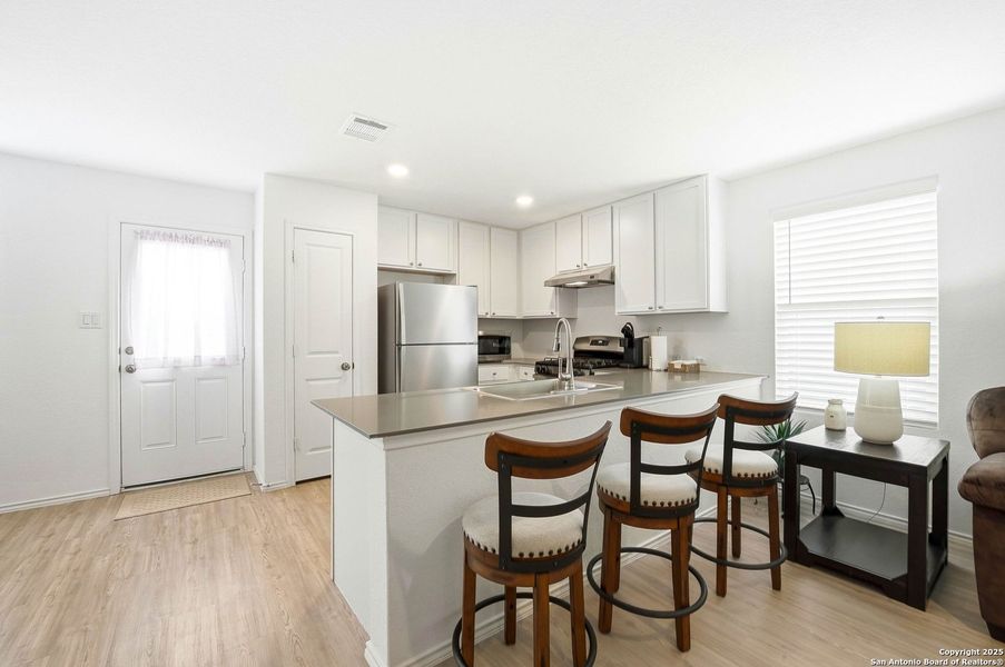 Furnished interior view inside a new home in Lodi Grove, Floresville (Image 9).