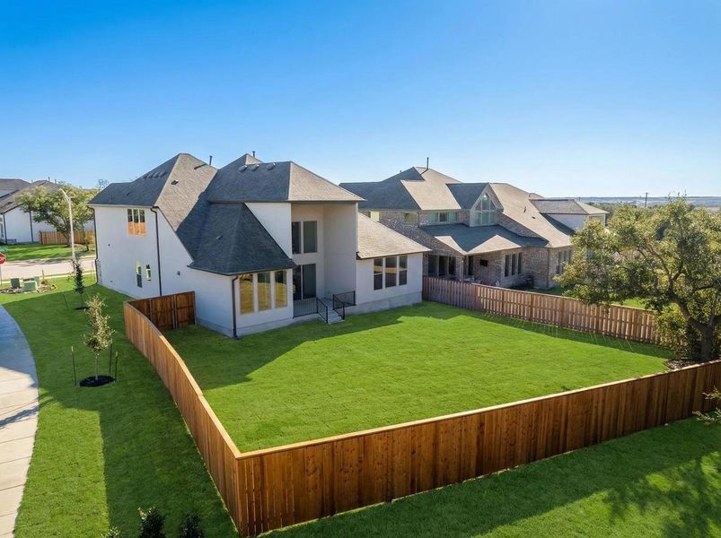 Exterior details and patio area of a home in Parmer Ranch 60, Georgetown (Image 3).