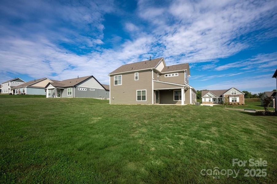 Exterior details and patio area of a home in Stoneridge Hills, Rock Hill (Image 28).