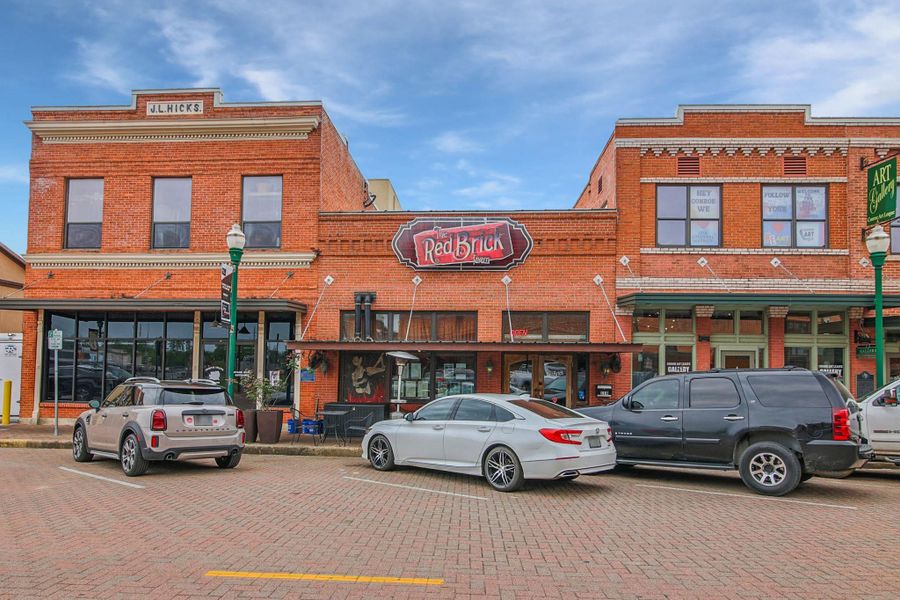 Front exterior of a new home in Silverthorne, Conroe, TX, highlighting curb appeal (Image 9). Front exterior of a new home in Silverthorne, Conroe, TX, highlighting curb appeal (Image 9).