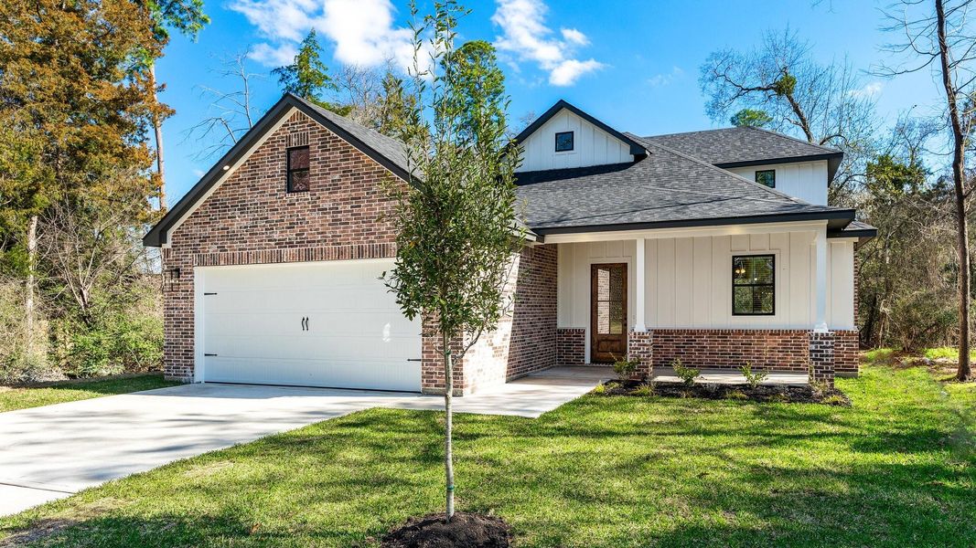 Front exterior of a new home in , Montgomery, TX, highlighting curb appeal (Image 1). Front exterior of a new home in , Montgomery, TX, highlighting curb appeal (Image 1).