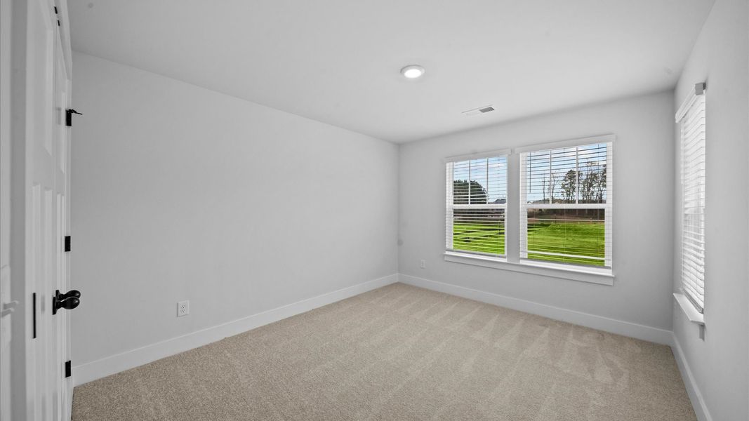 First-class bedroom with generous proportions, a walk-in closet, and beautiful natural light through large windows First-class bedroom with generous proportions, a walk-in closet, and beautiful natural light through large windows