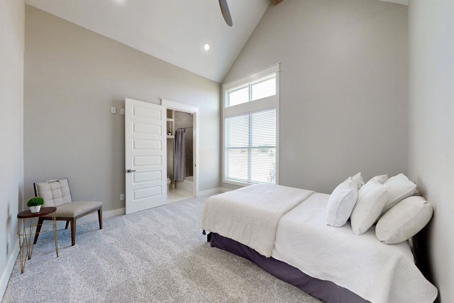 ach bedroom has a beautiful ceiling line and big windows with lots of light. Custom paint, 2 inch faux wood blinds, ceiling fan and a big walk in closet. This one has it's own personal bathroom.