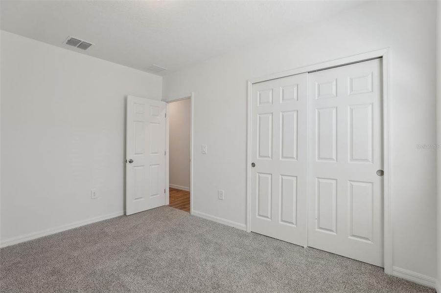 Spacious, unfurnished interior of a new home in Lawson Dunes - Signature Series, Haines City (Image 19).