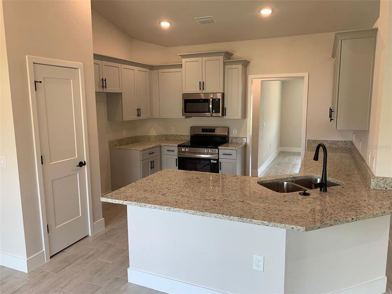 Furnished interior view inside a new home in , Port Charlotte (Image 6).