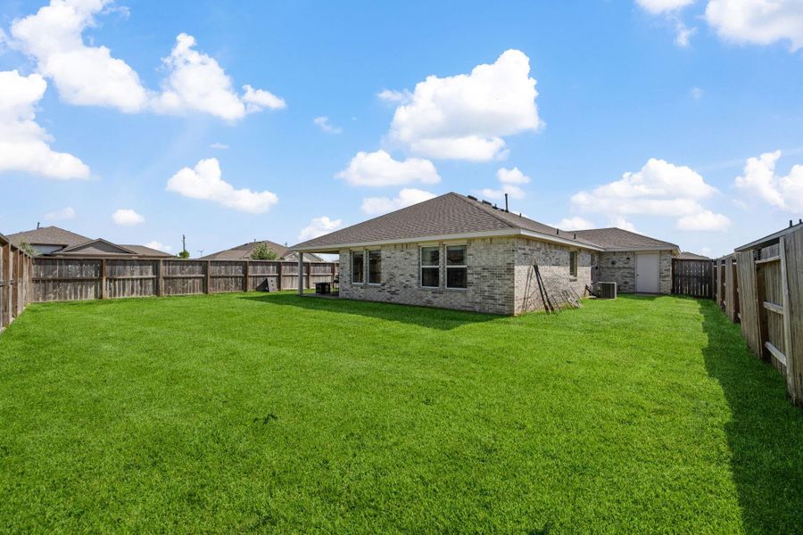 Exterior details and patio area of a home in River Ranch Meadows, Dayton (Image 3).