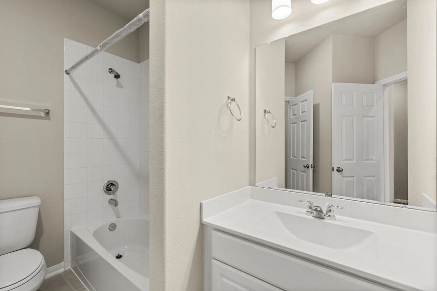 Furnished interior view inside a new home in Spring Creek Trails, Magnolia (Image 8).