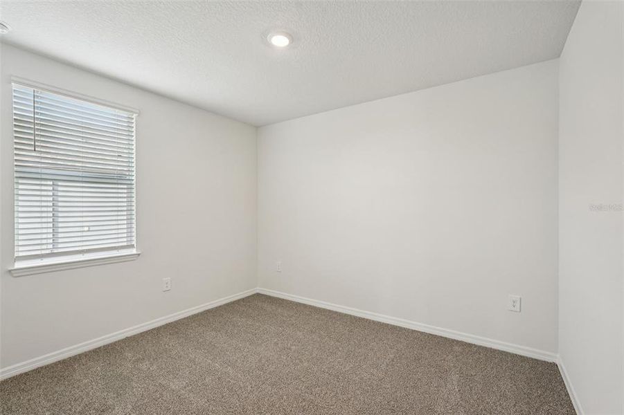 Spacious, unfurnished interior of a new home in Oakfield Trails - Signature Series, Parrish (Image 35).