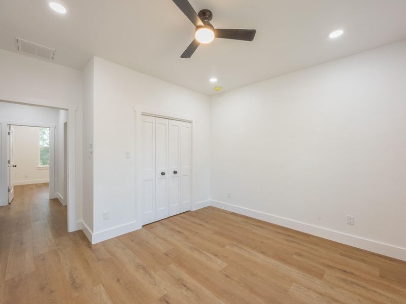 Generously sized with neutral tones and ample closet space, this secondary bedroom is perfect for guests, kids, or a home office setup. Generously sized with neutral tones and ample closet space, this secondary bedroom is perfect for guests, kids, or a home office setup.