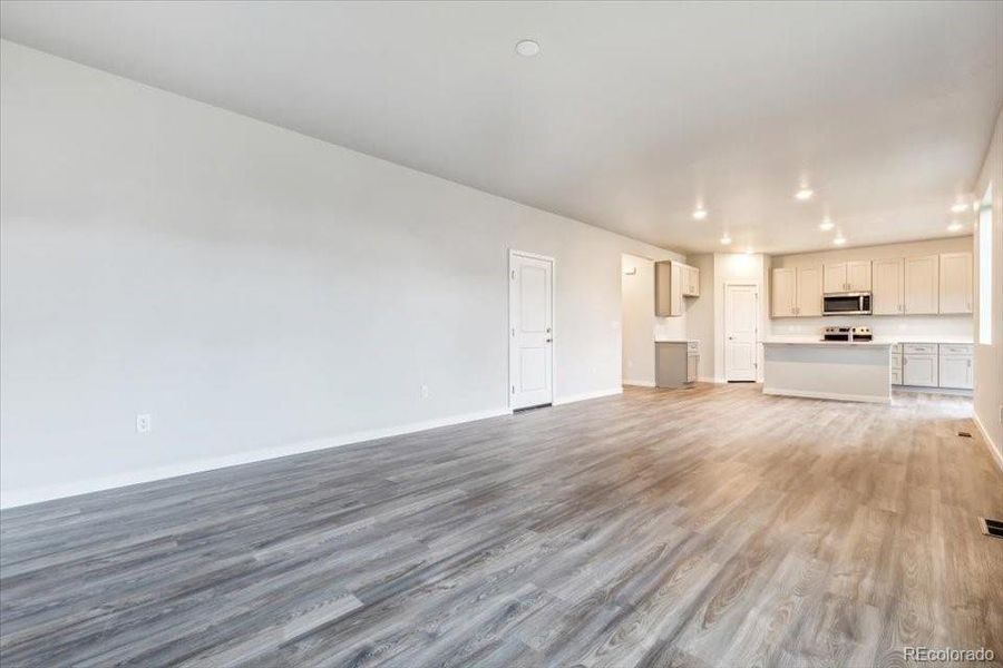 Spacious, unfurnished interior of a new home in The Haven II Collection  at Painted Prairie, Aurora (Image 19).