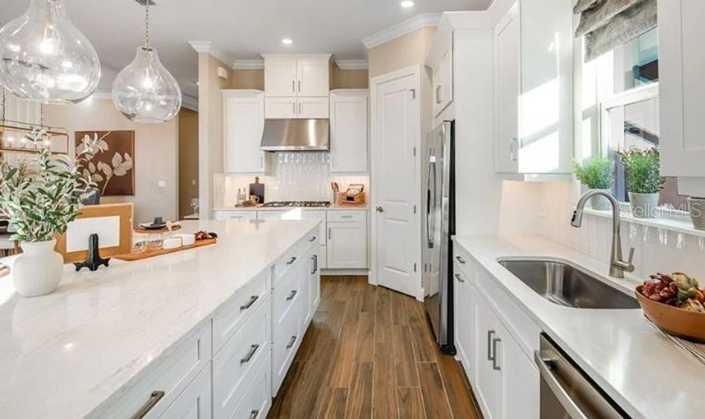 Furnished interior view inside a new home in Center Lake Ranch Community Group Page, St. Cloud (Image 15).
