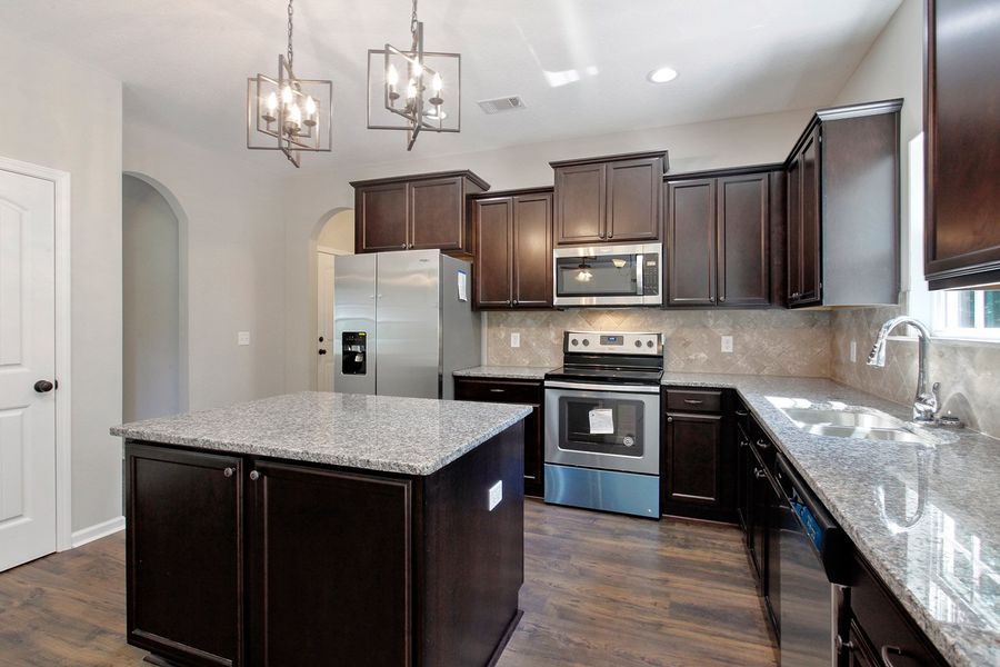 Representative furnished interior of a home built from the The Arcadia by RTS Homes in Doctor's Creek, Ludowici (Image 7).