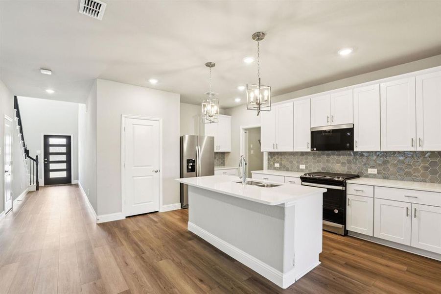 Furnished interior view inside a new home in Simpson Crossing - Spring Series, McKinney (Image 9). Furnished interior view inside a new home in Simpson Crossing - Spring Series, McKinney (Image 9).