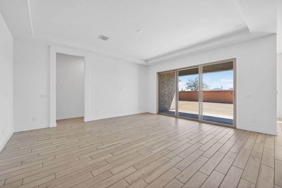 Spacious, unfurnished interior of a new home in Legado, Queen Creek (Image 13).