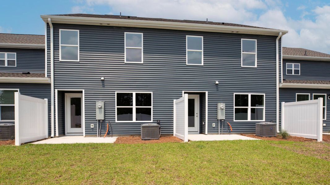 Exterior details and patio area of a home in Townes at Seabrooke, Leland (Image 3).