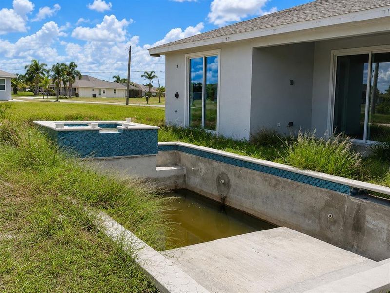 Exterior details and patio area of a home in , Rotonda West (Image 3).