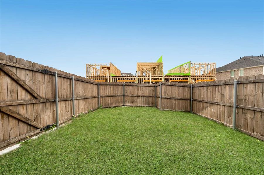 Exterior details and patio area of a home in Heritage Village, Haltom City (Image 19).
