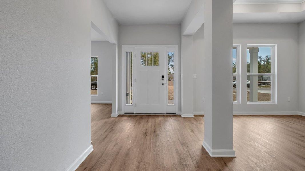 Representative unfurnished interior of a home built from the The Mckenzie by D.R. Horton in Greystone, Crawfordville (Image 13).