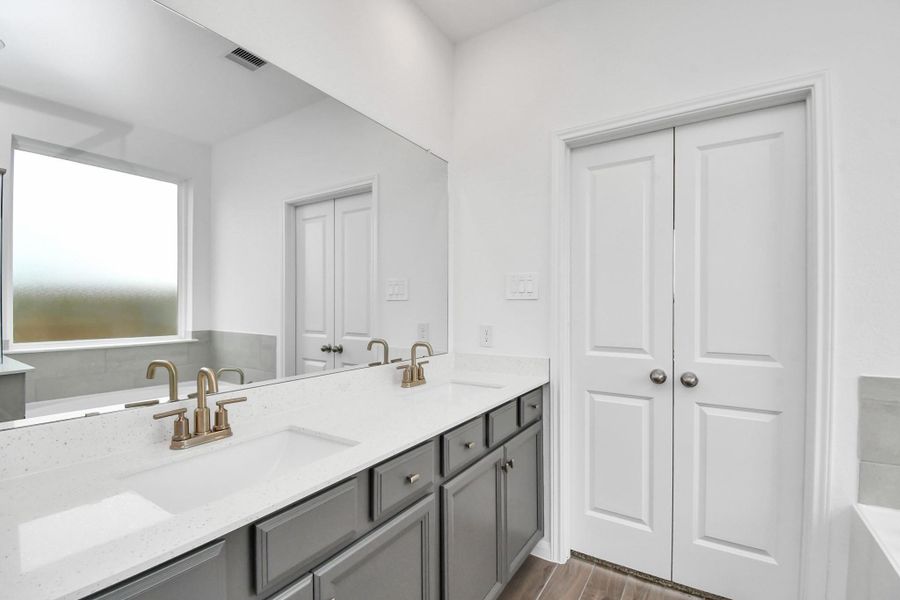 Furnished interior view inside a new home in Sunterra, Katy (Image 4).