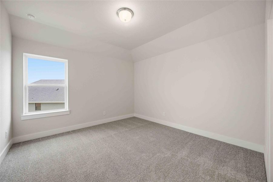 Spacious, unfurnished interior of a new home in Ellwood, Iowa Colony (Image 19).