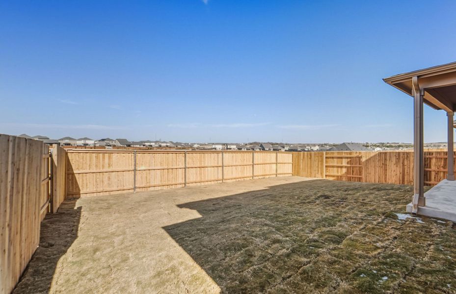 Exterior details and patio area of a home in Sunfield, Buda (Image 22).