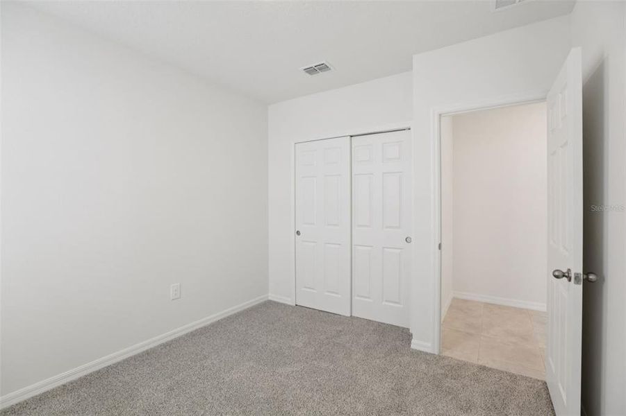 Spacious, unfurnished interior of a new home in Springs at Lake Alfred - Classic Series, Lake Alfred (Image 36).