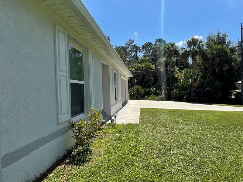 Exterior details and patio area of a home in , Port Charlotte (Image 29).