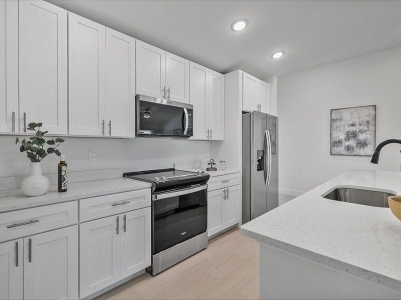 Representative furnished interior of a home built from the The Paradise Cove II by Sunlife Homes LLC in Cape Coral, Cape Coral (Image 9).