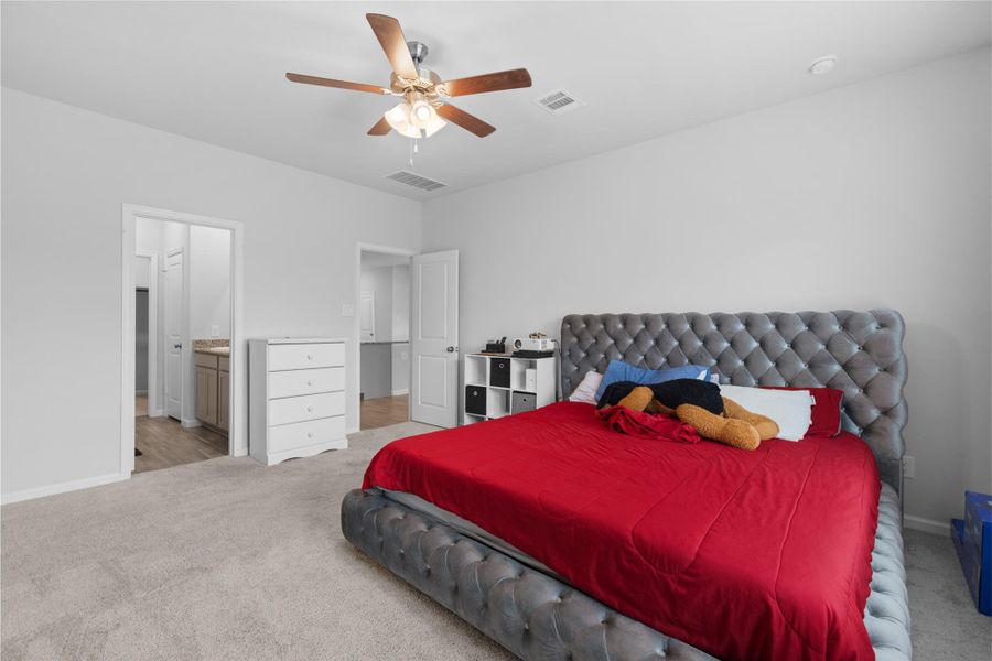 Furnished interior view inside a new home in Lakes at Black Oak, Magnolia (Image 12).