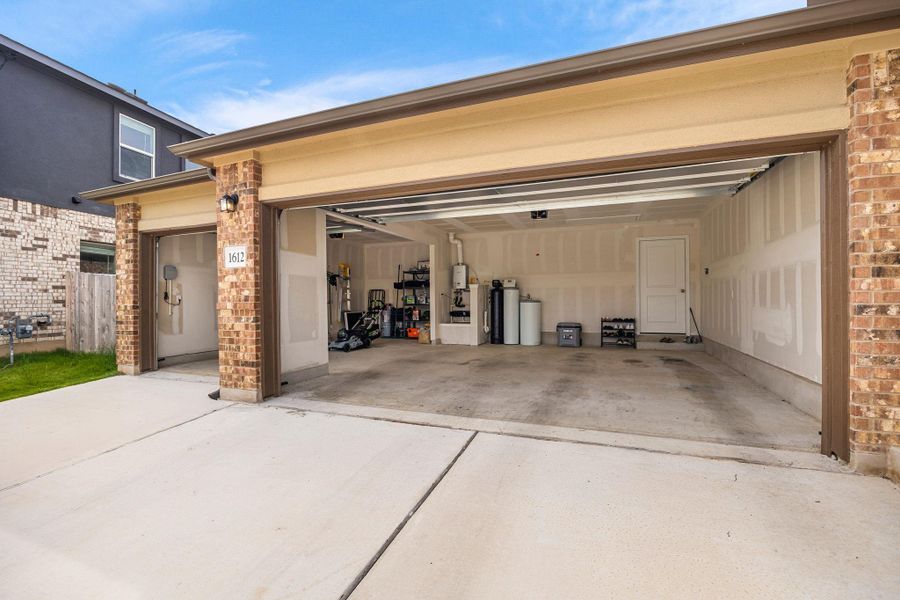 Functional attached 3- car side-by-side garage offers ample storage space and convenient direct entry.