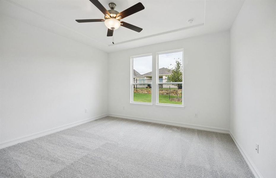 Elegant owner's suite with large windows