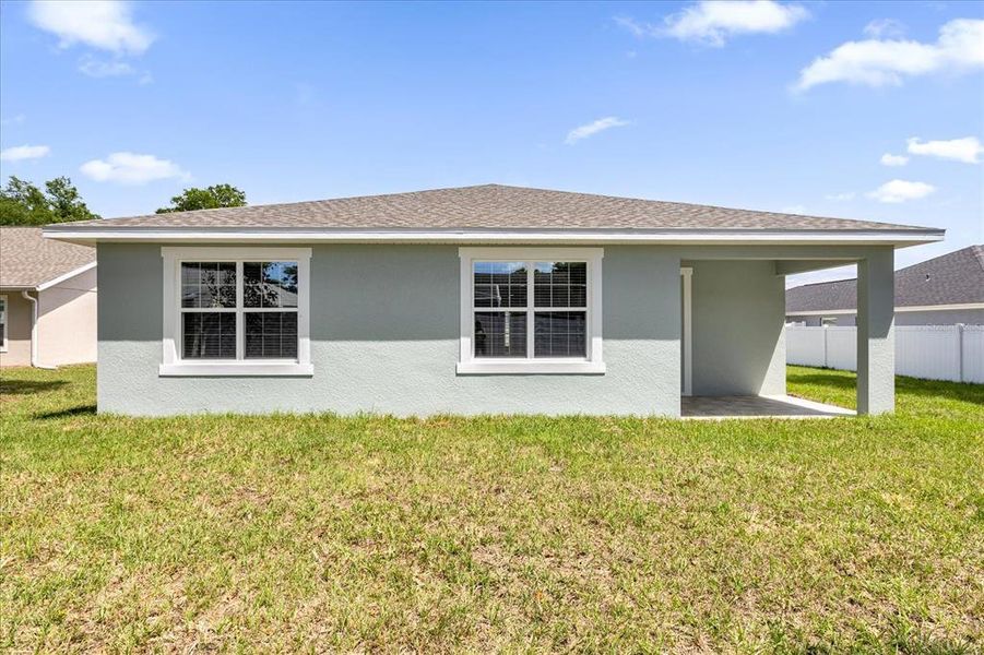 Exterior details and patio area of a home in , Summerfield (Image 18).