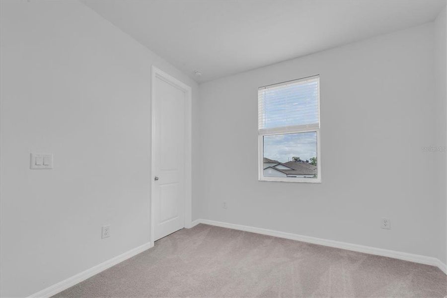 Spacious, unfurnished interior of a new home in Hilltop Point, Dade City (Image 22).