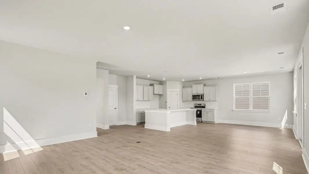 Representative unfurnished interior of a home built from the Mackenzie2 by D.R. Horton in Riverlake, Supply (Image 8).