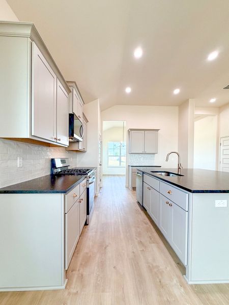 Furnished interior view inside a new home in TerraVista, Victoria (Image 6).