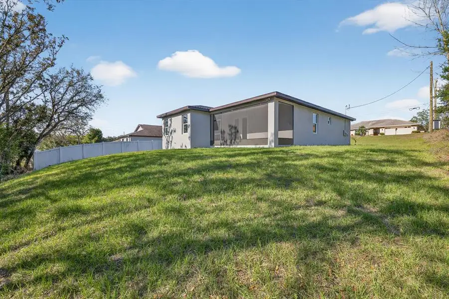 Exterior details and patio area of a home in , Spring Hill (Image 3).