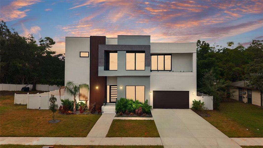 Front exterior of a new home in , Tampa, FL, highlighting curb appeal (Image 2).