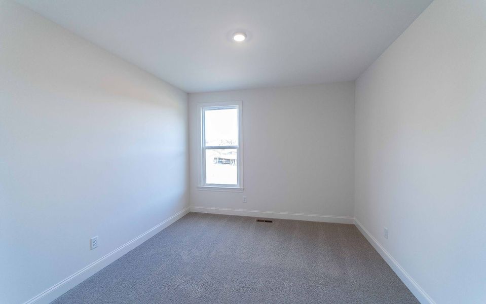 Spacious, unfurnished interior of a new home in Aden Woods, Fairview (Image 26).