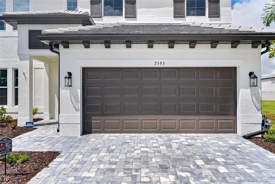 Front exterior of a new home in , Sarasota, FL, highlighting curb appeal (Image 29).