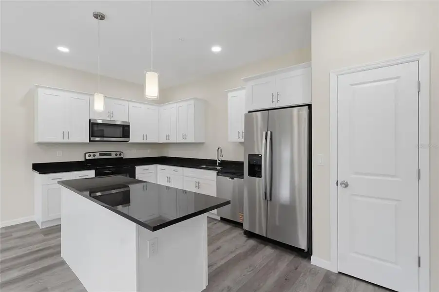 Furnished interior view inside a new home in , Tampa (Image 6). Furnished interior view inside a new home in , Tampa (Image 6).