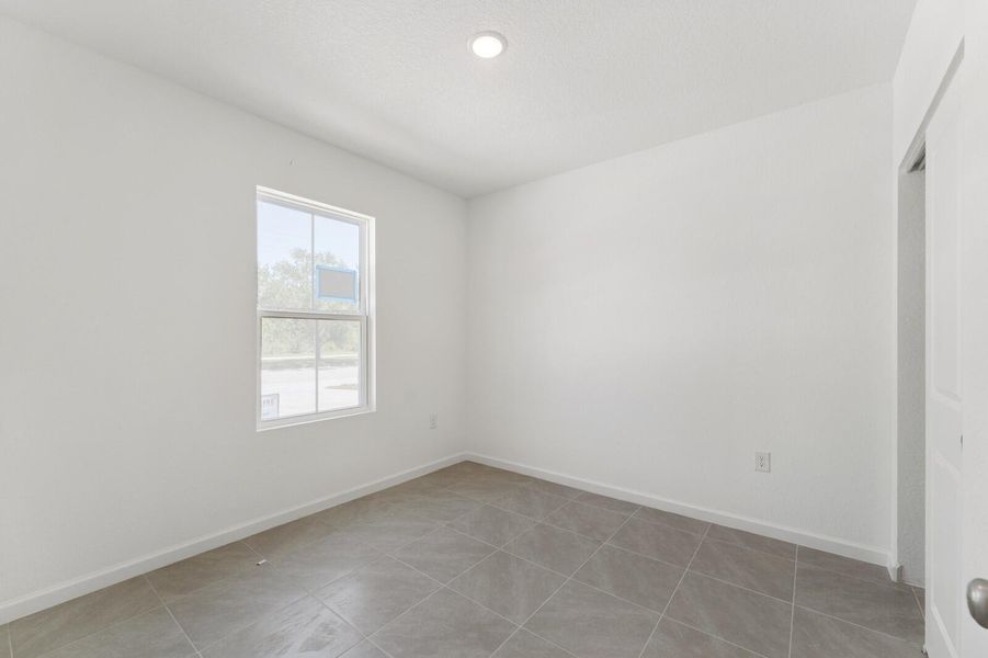 Spacious, unfurnished interior of a new home in Aspire at Port St. Lucie, Port St. Lucie (Image 25).