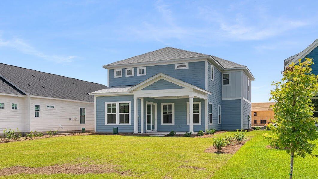 Front exterior of a new home in Midtown at Nexton, Summerville, SC, highlighting curb appeal (Image 1).
