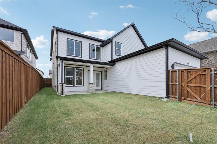 Exterior details and patio area of a home in , Rowlett (Image 24).