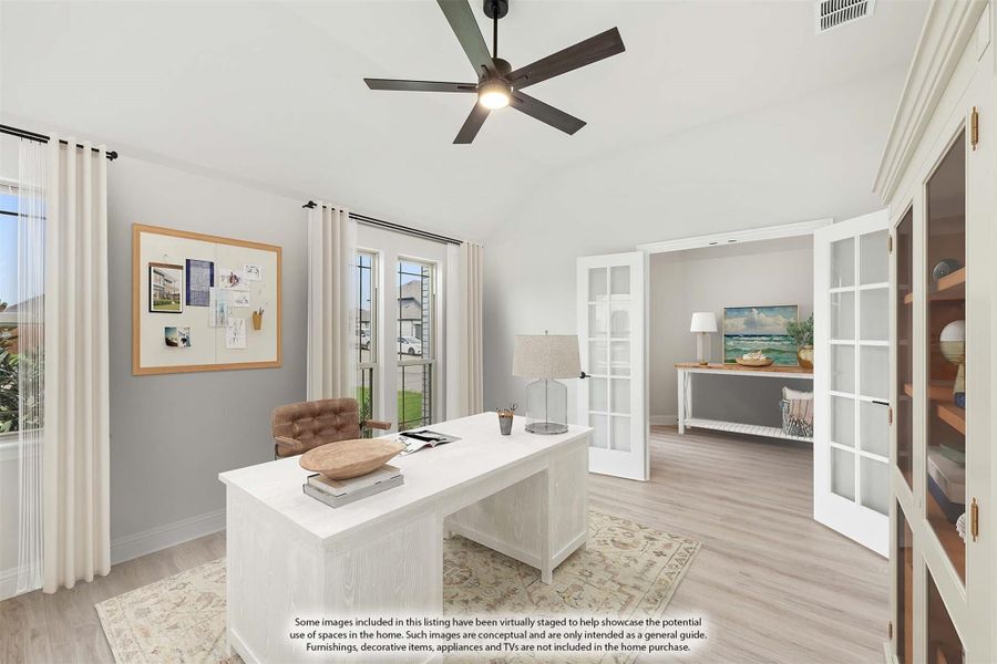 Home office with white desk, ceiling fan, French doors, and light hardwood floors
