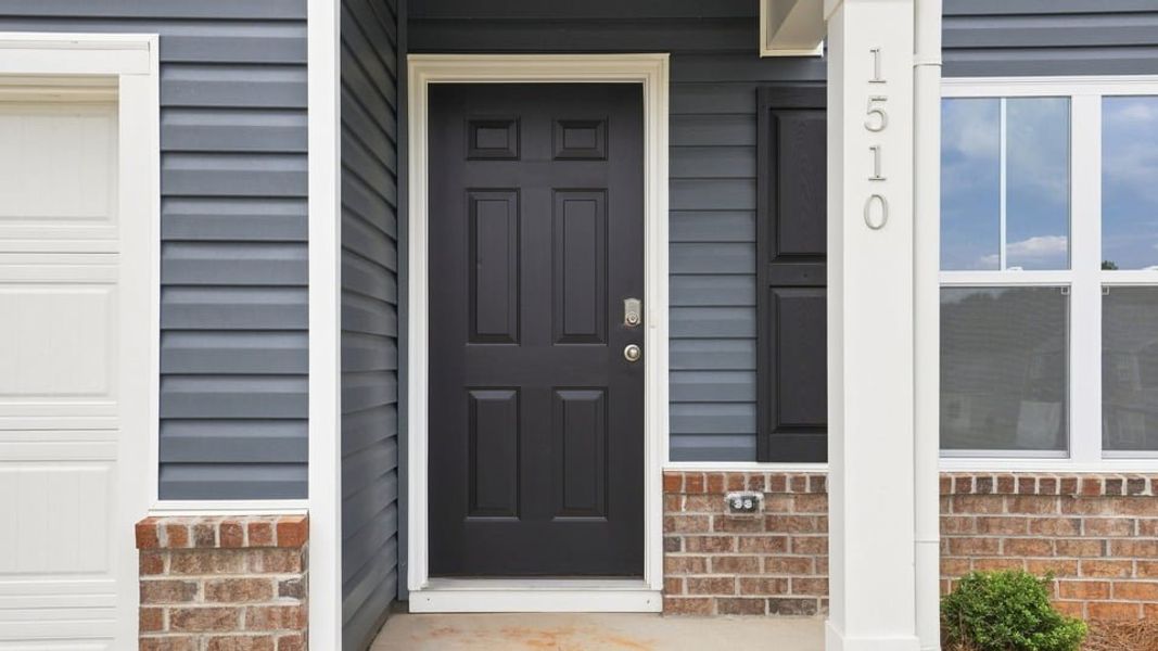 Exterior details and patio area of a home in Lakestone, Woodruff (Image 4).