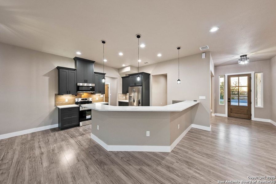 Furnished interior view inside a new home in , Kerrville (Image 38).